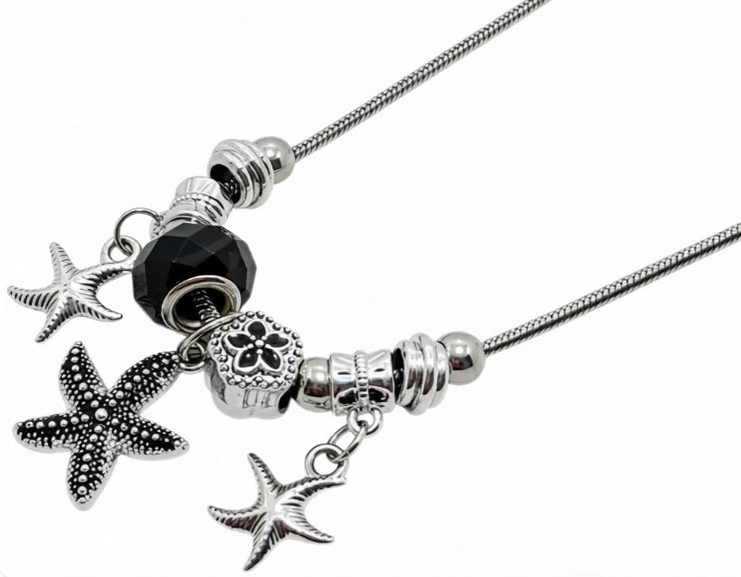 Cadena de acero quirurgico con dije simil pandora estrellas negra 45cm + 5cm
